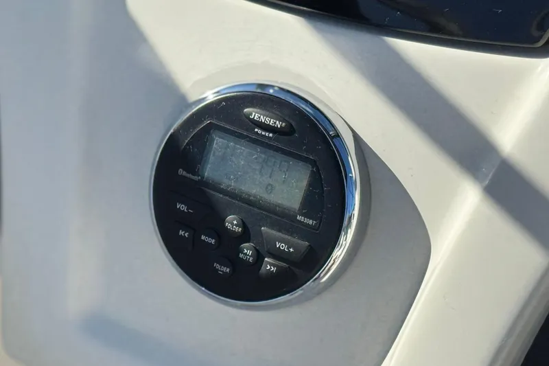 Slide: The Image of Jensen audio system on 2016 Tahoe 500 TS boat dashboard. - 22