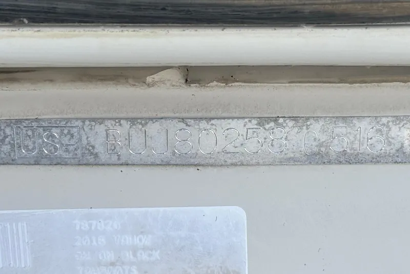 Slide: The Image of Serial number plate on a 2016 Tahoe 500 TS boat. - 27