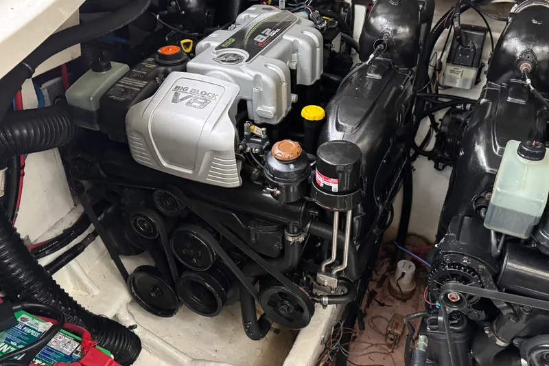 Slide: The Image of Engine compartment of a 2018 Sea Ray Sundancer 350 Coupe, featuring a Big Block V8 engine. - 61