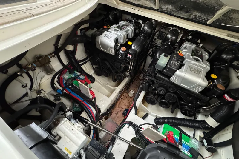 Slide: The Image of Engine compartment of 2018 Sea Ray Sundancer 350 Coupe with dual V8 engines. - 62