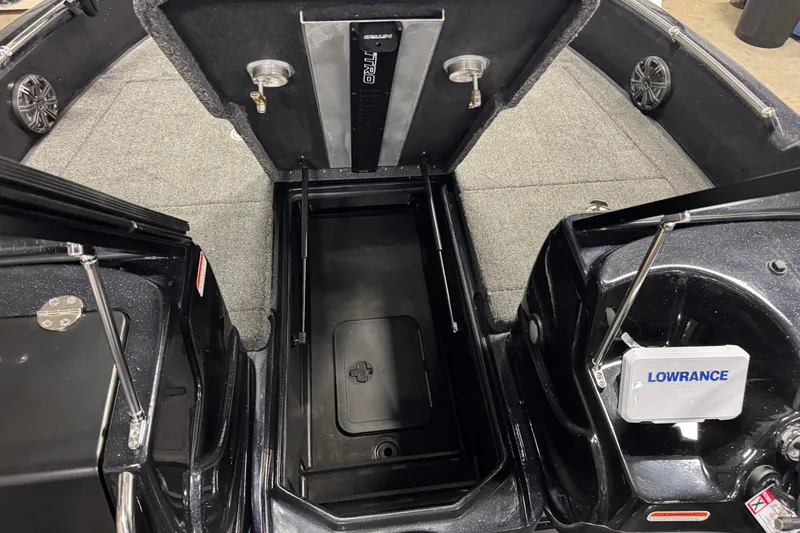 Slide: The Image of Interior view of 2026 Nitro ZV19 Sport boat with storage compartments and Lowrance equipment. - 23