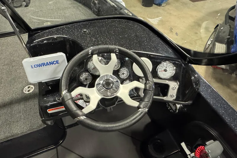 Slide: The Image of Steering console of 2026 Nitro ZV19 Sport boat with Lowrance display and gauges. - 9