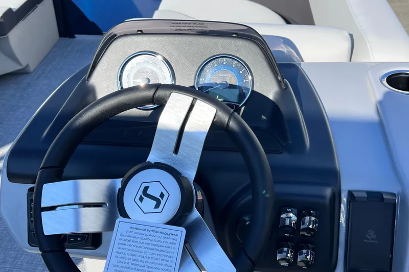 Slide: The Image of Steering wheel and dashboard of 2026 Harris 210 Cruiser SLDH boat. - 15