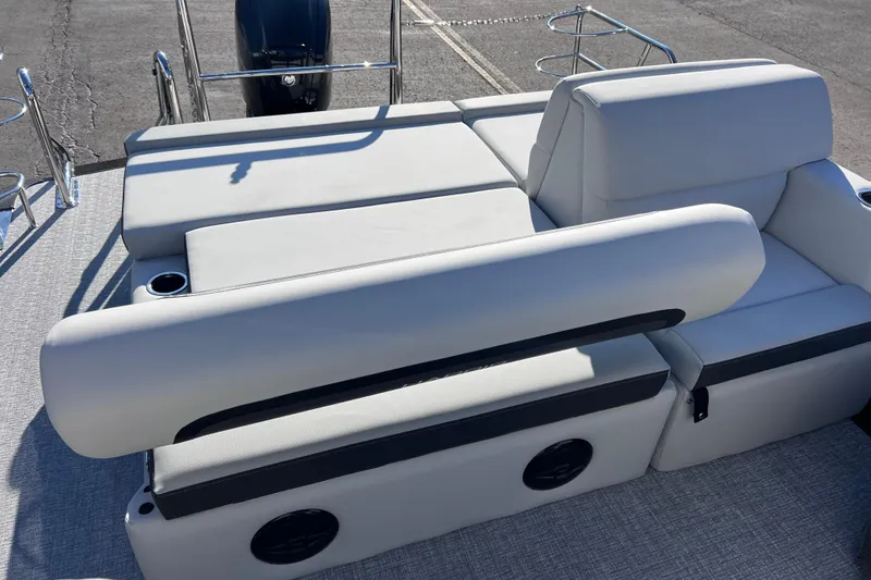 Slide: The Image of 2026 Harris 210 Cruiser SLDH boat with sleek seating and modern design. - 22