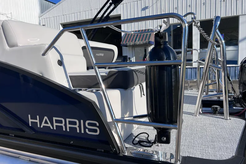 Slide: The Image of 2026 Harris 210 Cruiser SLDH boat with sleek seating and safety features. - 35