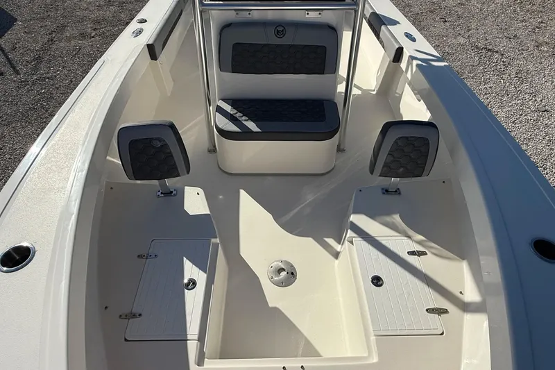 Slide: The Image of 2025 May-Craft 245 Offshore CC boat interior with seating and storage compartments. - 7