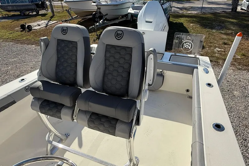 Slide: The Image of 2025 May-Craft 245 Offshore CC boat with dual cushioned seats and sleek design. - 11