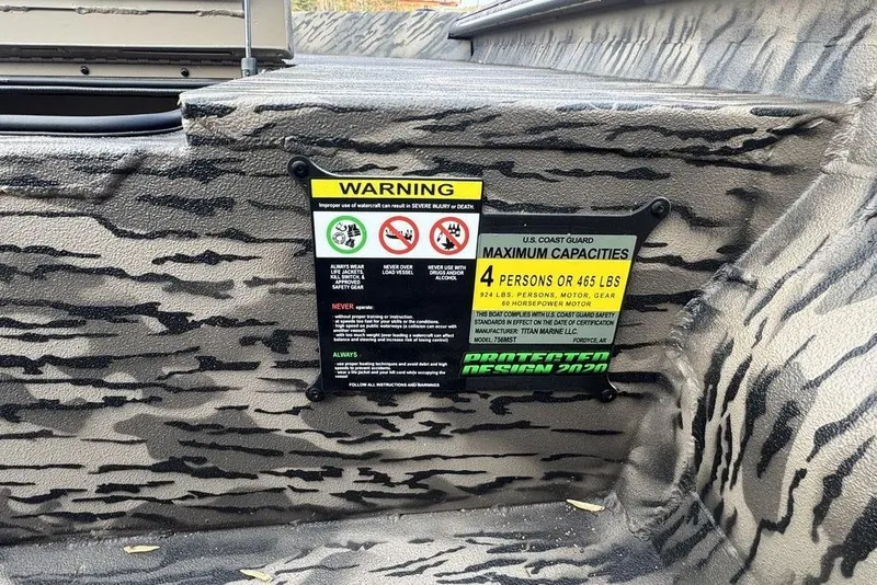 Slide: The Image of Warning label on 2026 Havoc 1756 boat, maximum capacity 4 persons or 465 lbs. - 12