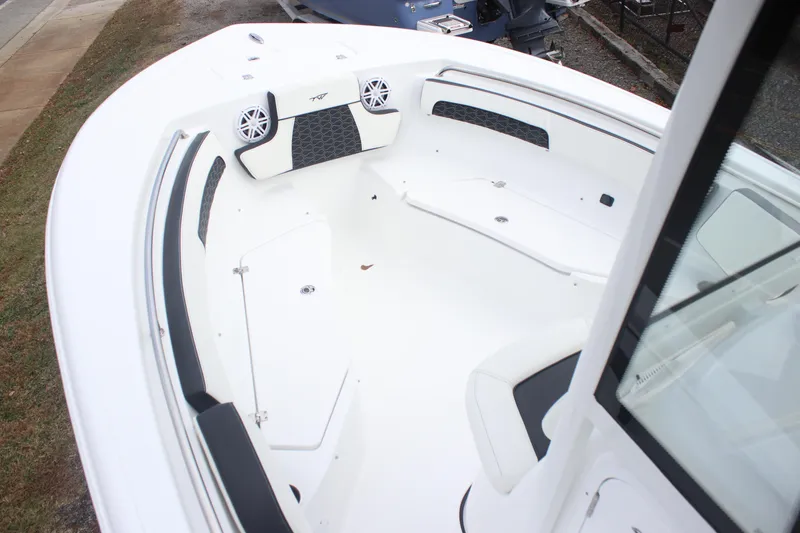 Slide: The Image of 2026 Tidewater 220 LXF boat interior with sleek seating and modern design. - 4