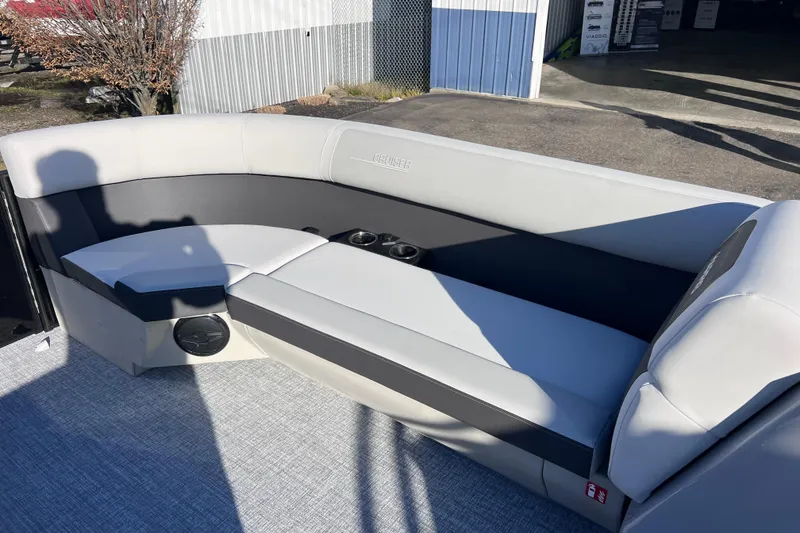 Slide: The Image of Luxurious seating on 2026 Harris Cruiser 230 SLDH Tritoon boat, featuring sleek design and comfort. - 16