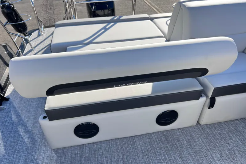 Slide: The Image of 2026 Harris Cruiser 230 SLDH Tritoon boat seating with sleek design and modern upholstery. - 23