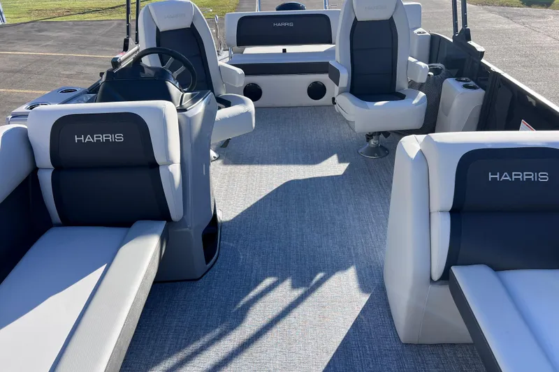 Slide: The Image of 2026 Harris Cruiser 230 SLDH Tritoon interior with luxurious seating and modern design. - 27
