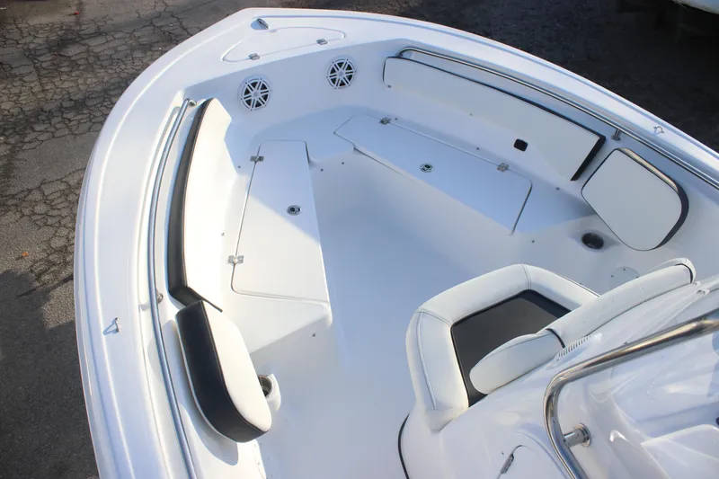 Slide: The Image of 2026 Tidewater 198 CC Adventure boat interior with seating and storage compartments. - 10