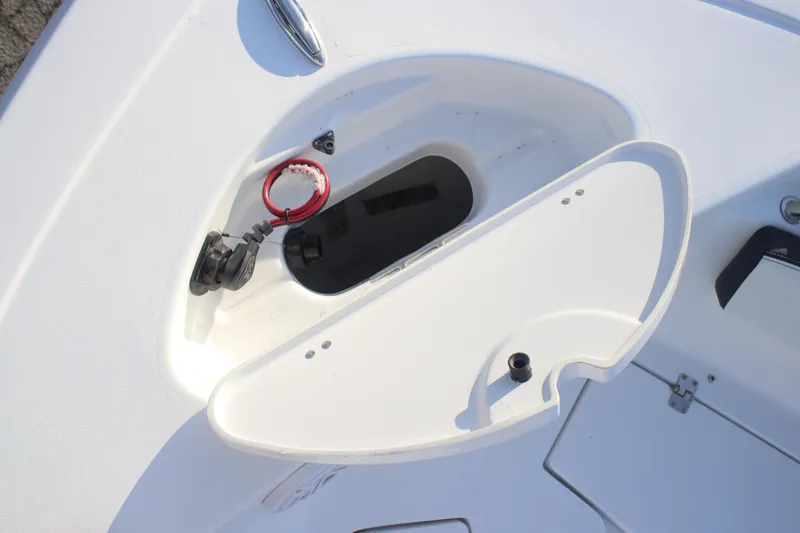 Slide: The Image of Open storage compartment on 2026 Tidewater 198 CC Adventure boat. - 11
