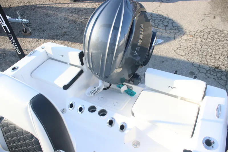 Slide: The Image of 2026 Tidewater 198 CC Adventure boat with Yamaha engine, rear seating, and rod holders. - 21