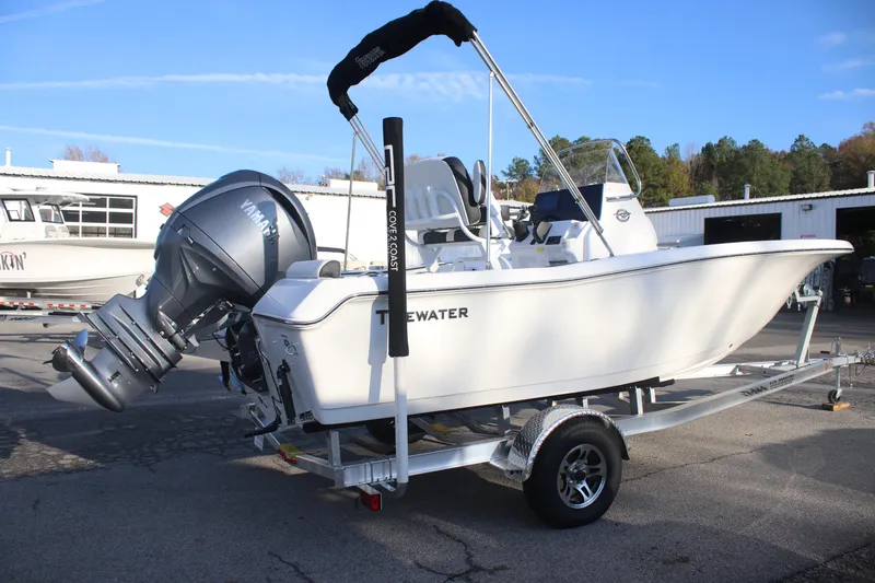 Slide: The Image of 2026 Tidewater 198 CC Adventure boat on trailer, featuring Yamaha outboard motor. - 6