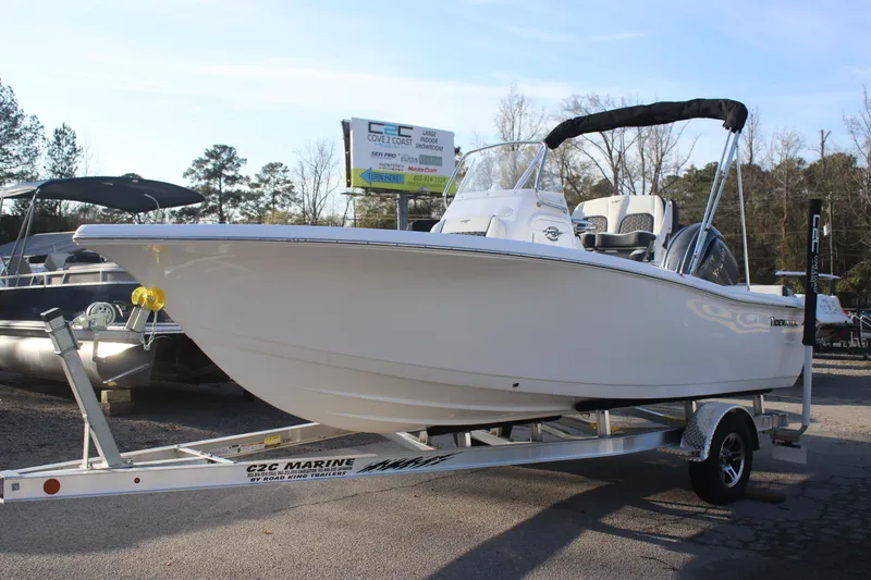 Slide: The Image of 2026 Tidewater 198 CC Adventure boat on trailer at dealership. - 7