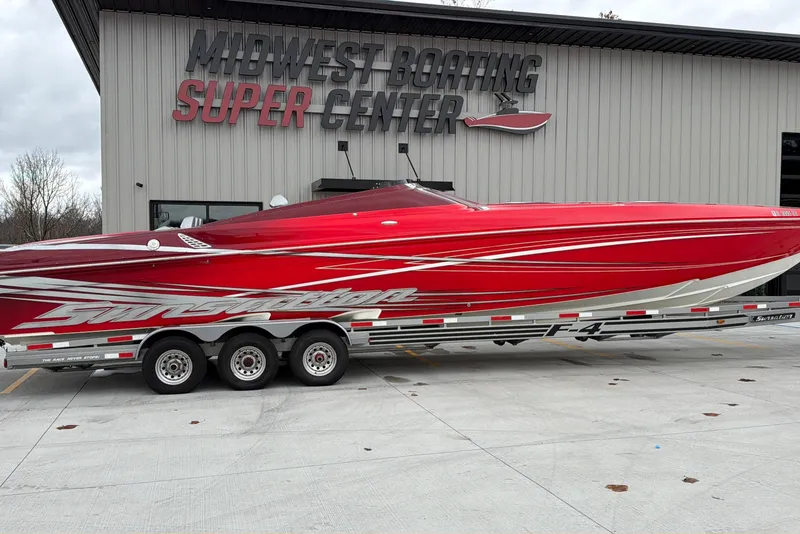 Slide: The Image of Red 2011 Sunsation F4 boat on trailer at Midwest Boating Super Center. - 3