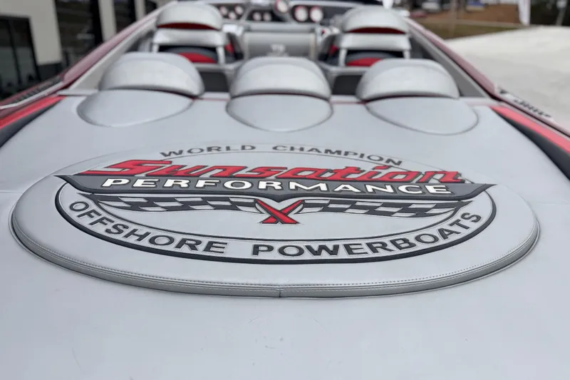Slide: The Image of 2011 Sunsation F4 offshore powerboat interior with branded seating and logo. - 30