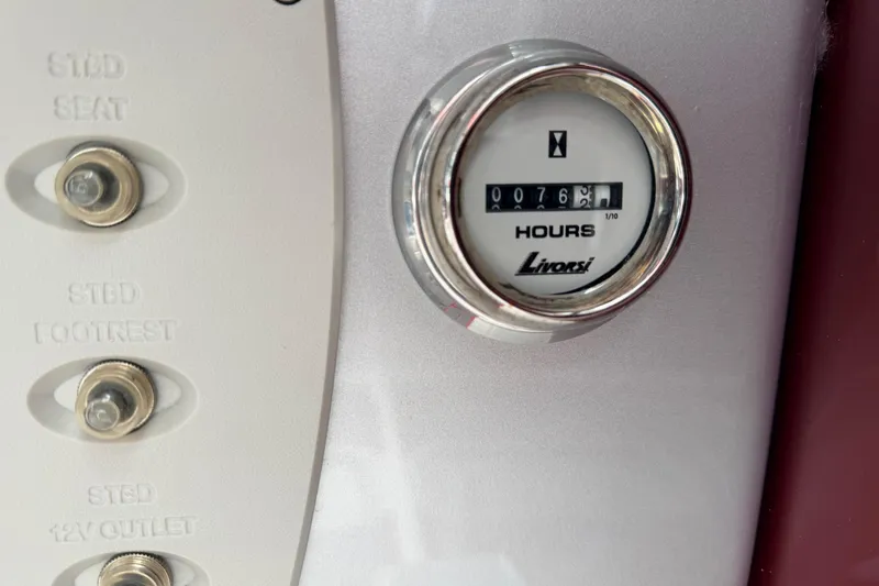 Slide: The Image of Hour meter on 2011 Sunsation F4 boat dashboard, showing 76.2 hours. - 33