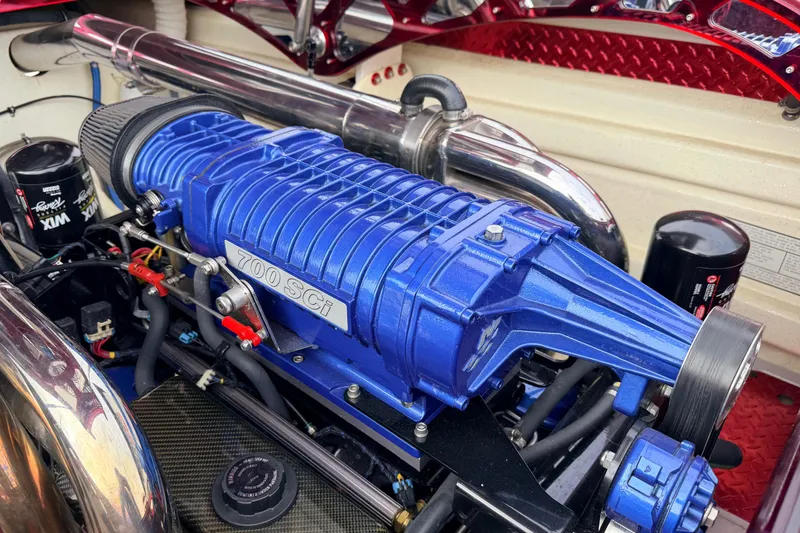 Slide: The Image of Close-up of a 2011 Sunsation F4 engine with blue 700 SCi supercharger. - 45