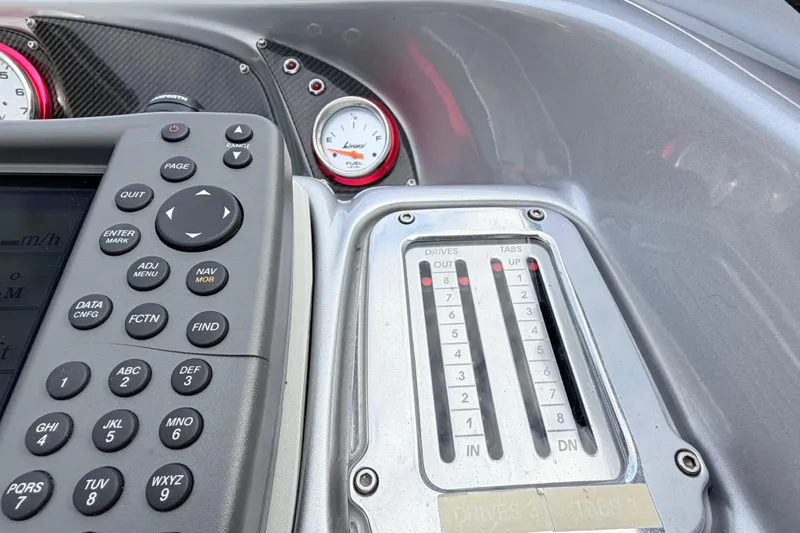 Slide: The Image of Control panel of a 2011 Sunsation F4 boat with gauges and buttons. - 55