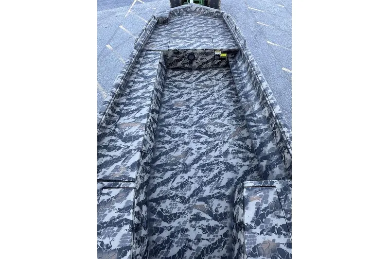 Slide: The Image of Camouflage interior of 2025 Havoc 1860 boat, showcasing spacious design and durable materials. - 8