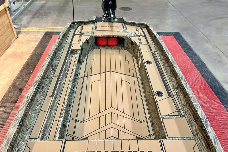 Slide: The Image of 2026 Tracker Grizzly 1756 T Marsh boat interior with camouflage design and spacious layout. - 14