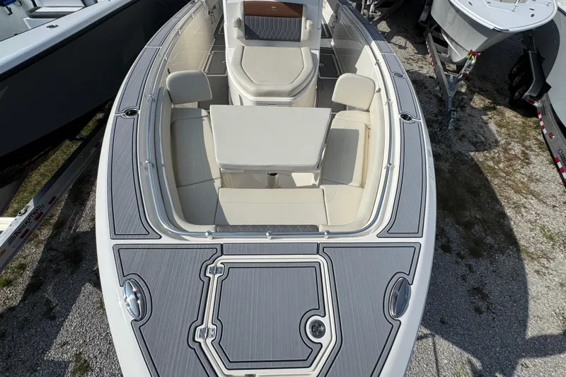 Slide: The Image of 2022 Cobia 350 Center Console boat with spacious seating and sleek design. - 15