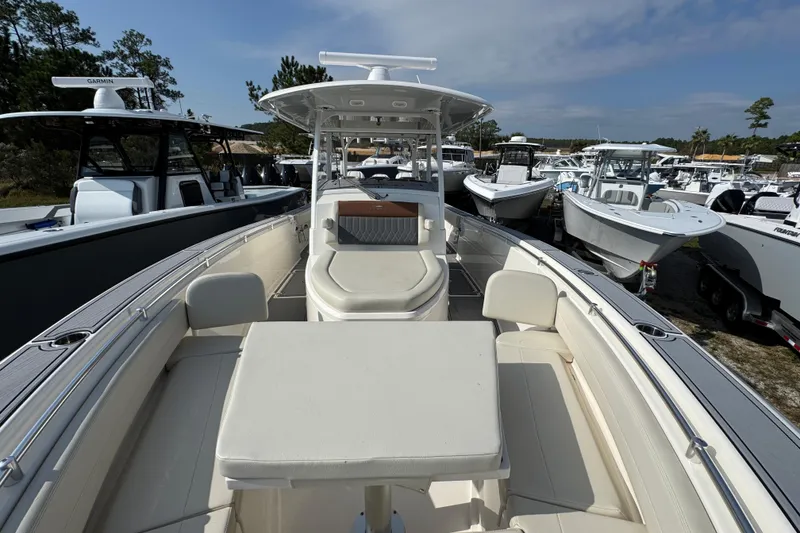Slide: The Image of 2022 Cobia 350 Center Console boat with spacious seating and modern design. - 17