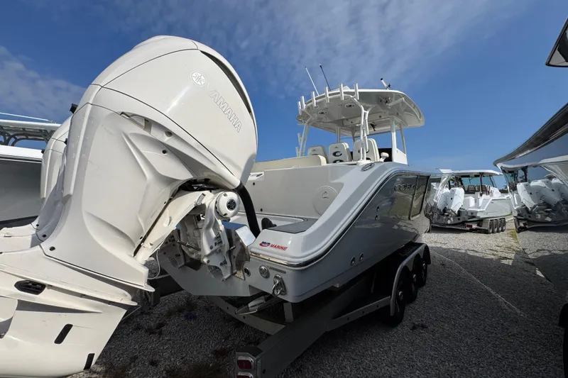 Slide: The Image of 2022 Cobia 350 Center Console boat with Yamaha outboard engine on trailer. - 7