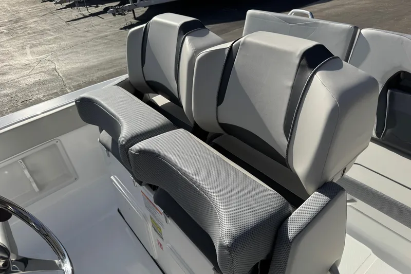 Slide: The Image of 2026 Scarab 235 Open SE boat seats, featuring modern design and comfortable upholstery. - 13