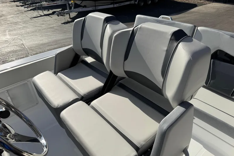 Slide: The Image of 2026 Scarab 235 Open SE boat seats, featuring modern gray and black upholstery. - 40