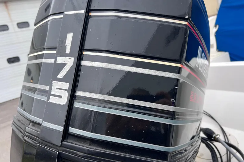 Slide: The Image of Close-up of a 175 horsepower outboard motor on a 1993 Bayliner Trophy Walkaround. - 7