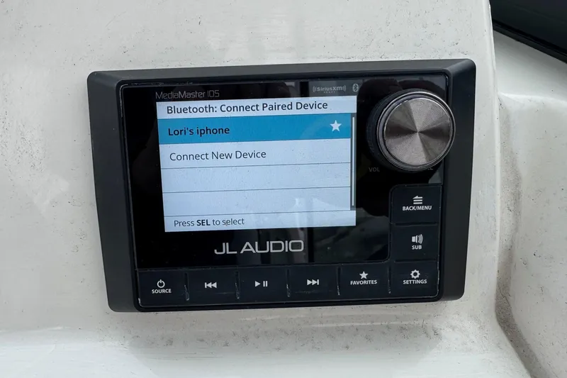 Slide: The Image of JL Audio MediaMaster 105 display on 2024 Cobia 240 Dual Console boat. - 27