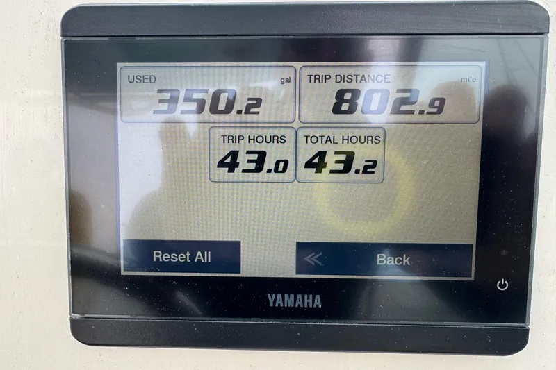 Slide: The Image of Yamaha display showing fuel usage, trip distance, and hours for 2024 Cobia 240 Dual Console. - 6