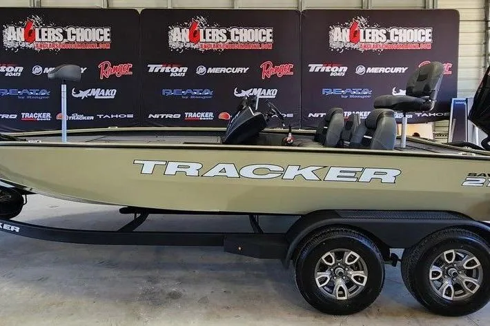 The Image of 2026 Tracker Savage 215 boat on trailer at Anglers Choice showroom. - 1