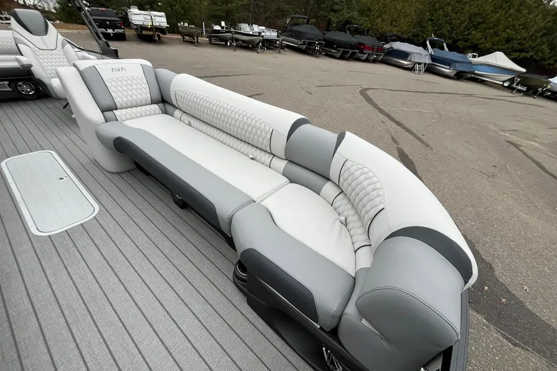 Slide: The Image of Luxurious seating on 2026 Avalon Catalina Versatile Rear Bench boat, featuring elegant gray and white upholstery. - 11