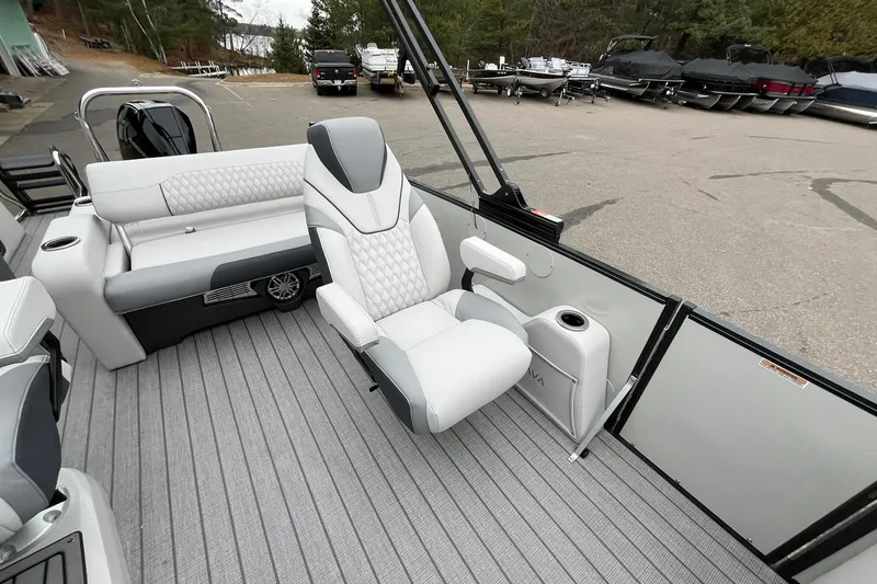Slide: The Image of 2026 Avalon Catalina Versatile Rear Bench boat interior with luxurious seating and modern design. - 14