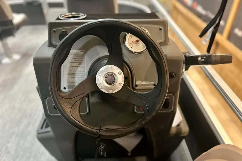 Slide: The Image of Steering wheel of 2026 Sun Tracker Bass Buggy 16 XL Select boat. - 10