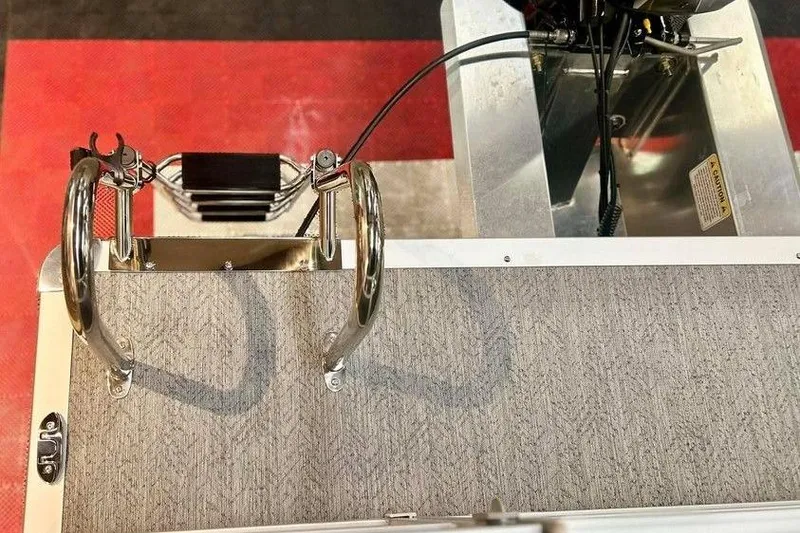 Slide: The Image of 2026 Sun Tracker Bass Buggy 16 XL Select boat ladder and deck detail. - 18