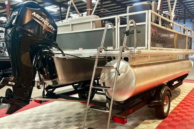Slide: The Image of 2026 Sun Tracker Bass Buggy 16 XL Select pontoon boat with Mercury outboard motor. - 3