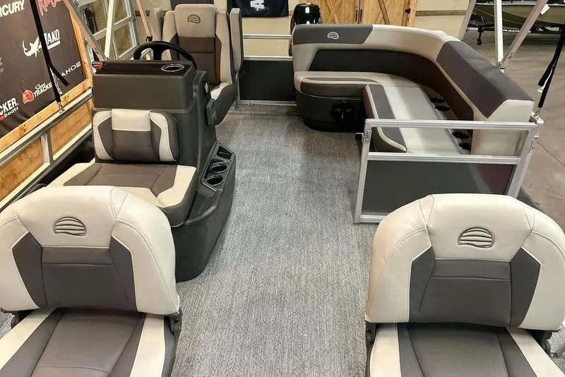 Slide: The Image of 2026 Sun Tracker Bass Buggy 16 XL Select interior with comfortable seating and modern design. - 8