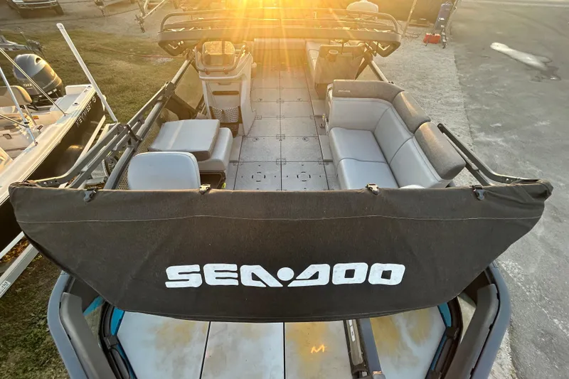 Slide: The Image of 2022 Sea-Doo Switch Sport 21 interior view at a boat dealership. - 13