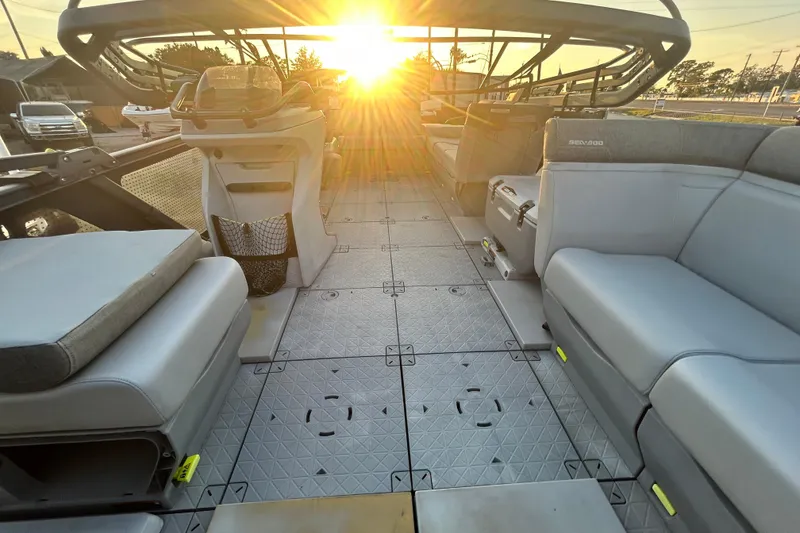 Slide: The Image of 2022 Sea-Doo Switch Sport 21 cockpit with steering console and seating. - 16