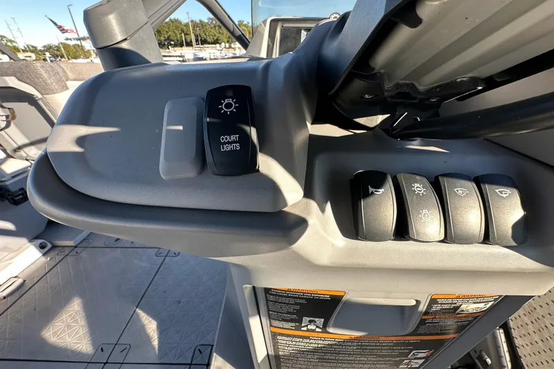 Slide: The Image of 2022 Sea-Doo Switch Sport 21 interior with seating and storage compartments. - 23