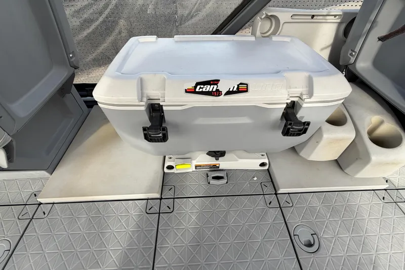 Slide: The Image of 2022 Sea-Doo Switch Sport 21 pontoon boat interior with seating and canopy. - 29