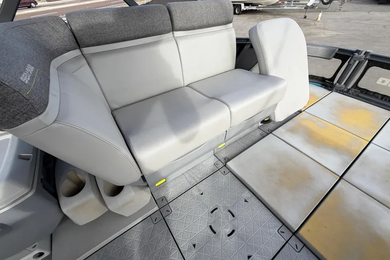 Slide: The Image of 2022 Sea-Doo Switch Sport 21 interior with seating and storage features. - 33