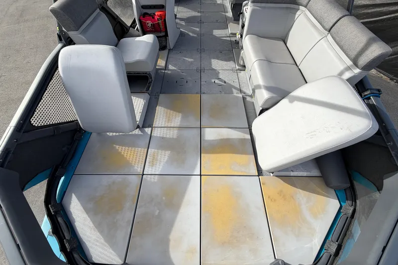 Slide: The Image of 2022 Sea-Doo Switch Sport 21 interior seating with gray upholstery and modular design. - 34