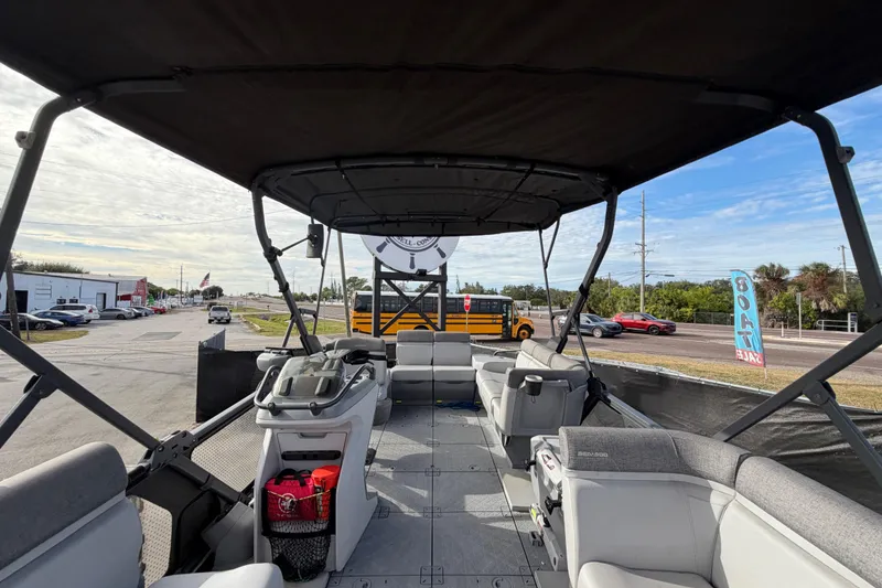 Slide: The Image of 2022 Sea-Doo Switch Sport 21 interior with steering console and spacious seating. - 39